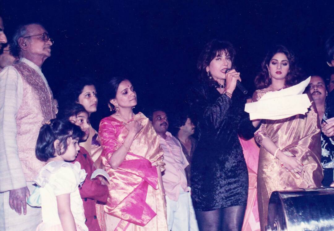 Shri Harkisanbhai and Bhawana Somaaya watching Sri Devi and Archana Puran Singh Perform